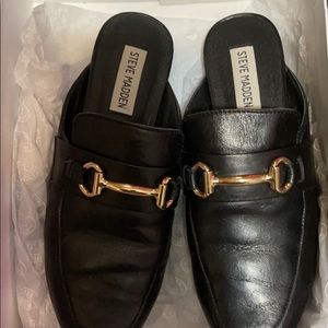 Slip ons, gold belt.